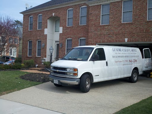 Lustre Clean truck-mounted cleaning van parked in front of a brick Northern Virginia home